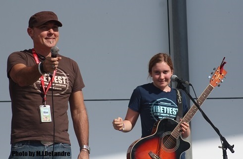 Photo of Al Buchan and a mentorship student on stage